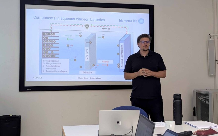 Florian Unger stellt sein Forschungsprojekt beim Workshop des NISys-Qualifizierungsprogramms vor