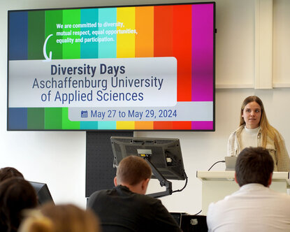 woman welcomes students on Diversity Days