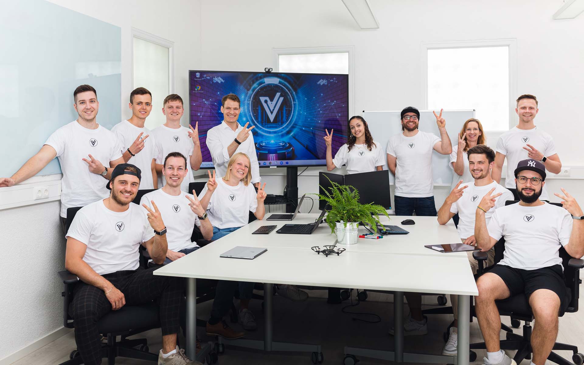 Gruppenfoto des VentureLab Teams mit Gründer und Leiter Prof. Dr. Boris Bauke.